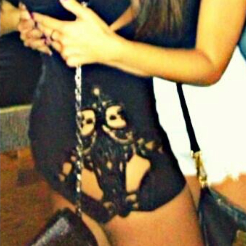 Black skirt with revealing thigh lace